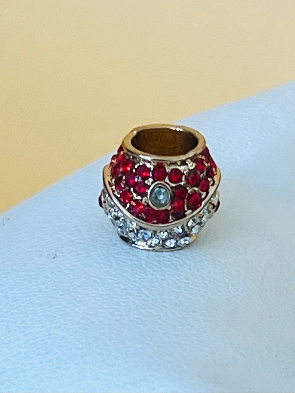Gold plated paved red & clear crystal bracelet charm
